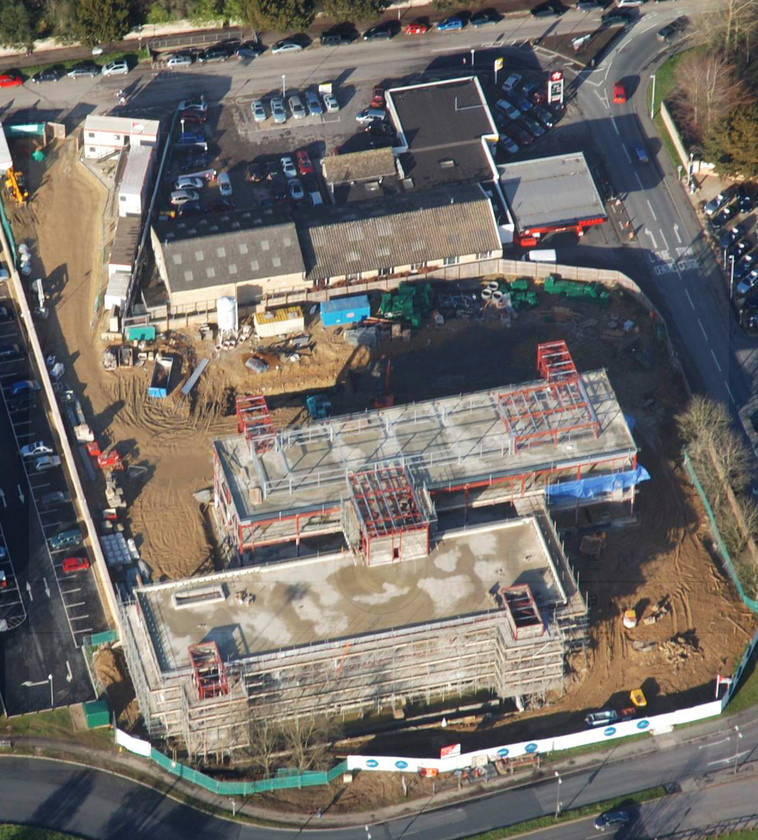 Aerial view Dec 2 
 Keywords: Construction, development, building, building site, safety, waste pipe, mains waste, hard hat, scaffolding, crane, steelwork, frame build, steel frame, girder, cherry picker, bolt, aerial photography, aerial view, foundations, staircase housing