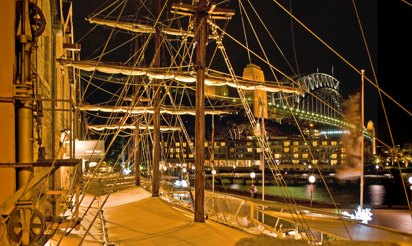 Sydney Harbour Waterfront 
 Keywords: Sydney, australia, waterfront, rigging, restaurant, harbour, bridge, wood, evening